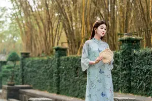 Graceful Ao Dai Girl Amidst Bamboo: Timeless Beauty and Serenity - image 4