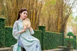 Graceful Ao Dai Girl Amidst Bamboo: Timeless Beauty and Serenity - image 0
