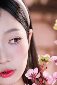 Graceful Asian Girl with Spring Blossoms Timeless Beauty Unveiled - image 5