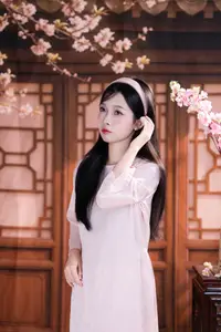 Graceful Asian Girl with Spring Blossoms Timeless Beauty Unveiled - image 6