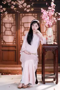 Graceful Asian Girl with Spring Blossoms Timeless Beauty Unveiled - image 4