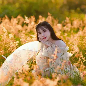 Golden Hour Dream: Ethereal Beauty in White Amidst a Blooming Field - image 13