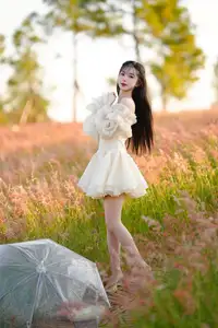 Golden Hour Dream: Ethereal Beauty in White Amidst a Blooming Field - image 4