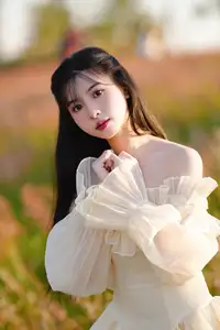 Golden Hour Dream: Ethereal Beauty in White Amidst a Blooming Field - image 2