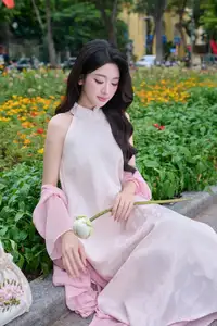 VGU No171: Vietnamese Beauty Graces a Flower Garden in Elegant Pink Ao Dai and Conical Hat - image 11