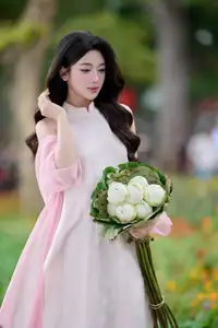 VGU No171: Vietnamese Beauty Graces a Flower Garden in Elegant Pink Ao Dai and Conical Hat - image 6