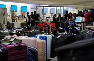 Global Tech Outage Causes Chaos: Travelers Stranded at Airports Due to Blue Screen Error - image 6