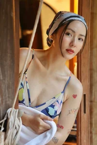 Singer Phuong Linh at 41: Embracing Confidence, Bikinis, and Tattoos - image 7