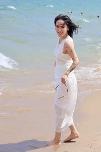 Singer Phuong Linh at 41: Embracing Confidence, Bikinis, and Tattoos - image 4