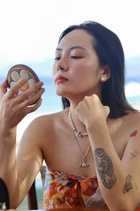 Singer Phuong Linh at 41: Embracing Confidence, Bikinis, and Tattoos - image 6