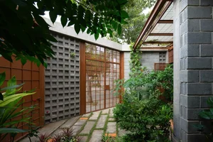 The Beauty of Raw Architecture: A Unique Unpainted House Designed as a Self-Sustaining Ecosystem - image 4