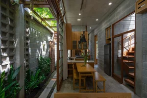 The Beauty of Raw Architecture: A Unique Unpainted House Designed as a Self-Sustaining Ecosystem - image 2