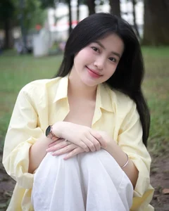 The Captivating Charm of a Martial Arts Land Beauty with a Radiant Smile - image 5