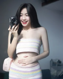 The Captivating Charm of a Martial Arts Land Beauty with a Radiant Smile - image 6