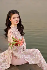 Vietnamese Ao Dai Beauty by the Lake at Sunset: Graceful Girl with Vibrant Gladiolus Flowers. - image 6