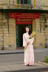 Vietnamese Ao Dai Beauty by the Lake at Sunset: Graceful Girl with Vibrant Gladiolus Flowers. - image 2