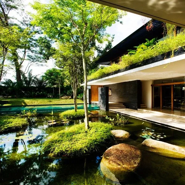 Stunning Resort-Style Home Features Lush Rooftop Garden and Serene Water Features
