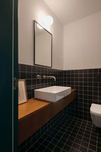 Modern 1960s Apartment Renovation into Flexible Studio and Living Space - image 26