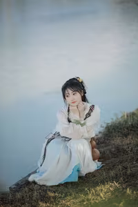 YiTuYu Vol.8273: Chun Yu – Ethereal Wuxia Beauty and Serene Warrior at Sunset - image 4