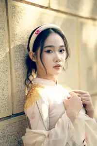 Graceful Vietnamese Beauty: Captivating Charm of a Girl in Elegant Traditional Attire - image 0