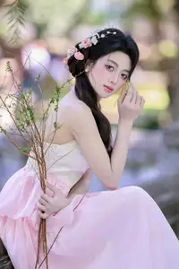 Discover the gentle charm of an Asian beauty in elegant attire, exuding grace and allure 1000025175 - image 0