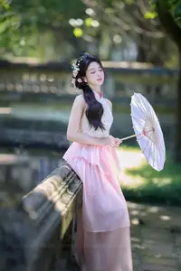 Discover the gentle charm of an Asian beauty in elegant attire, exuding grace and allure 1000025175 - image 6
