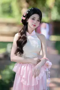 Discover the gentle charm of an Asian beauty in elegant attire, exuding grace and allure 1000025175 - image 3