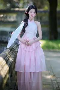 Discover the gentle charm of an Asian beauty in elegant attire, exuding grace and allure 1000025175 - image 4