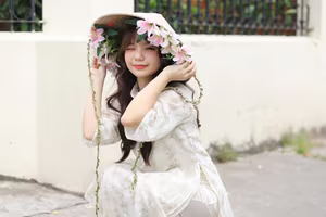 VGU No.143: Discover the Ethereal Beauty of a Vietnamese Girl in Ao Dai and Floral Conical Hat - image 6