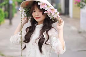VGU No.143: Discover the Ethereal Beauty of a Vietnamese Girl in Ao Dai and Floral Conical Hat - image 4