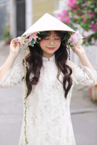 VGU No.143: Discover the Ethereal Beauty of a Vietnamese Girl in Ao Dai and Floral Conical Hat - image 10