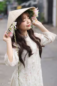 VGU No.143: Discover the Ethereal Beauty of a Vietnamese Girl in Ao Dai and Floral Conical Hat - image 8