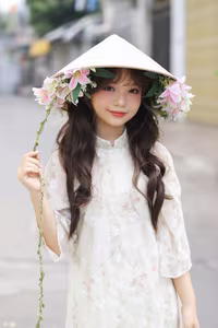 VGU No.143: Discover the Ethereal Beauty of a Vietnamese Girl in Ao Dai and Floral Conical Hat - image 16