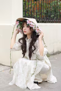 VGU No.143: Discover the Ethereal Beauty of a Vietnamese Girl in Ao Dai and Floral Conical Hat - image 11
