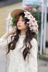 VGU No.143: Discover the Ethereal Beauty of a Vietnamese Girl in Ao Dai and Floral Conical Hat - image 12