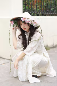 VGU No.143: Discover the Ethereal Beauty of a Vietnamese Girl in Ao Dai and Floral Conical Hat - image 14