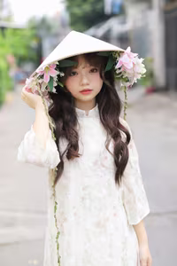VGU No.143: Discover the Ethereal Beauty of a Vietnamese Girl in Ao Dai and Floral Conical Hat - image 9