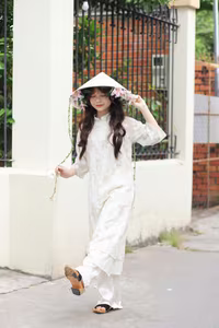 VGU No.143: Discover the Ethereal Beauty of a Vietnamese Girl in Ao Dai and Floral Conical Hat - image 15