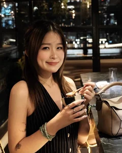 Rich Kid Chao Transitions from Cute to Seductive in Deep-Cut Dress - image 9