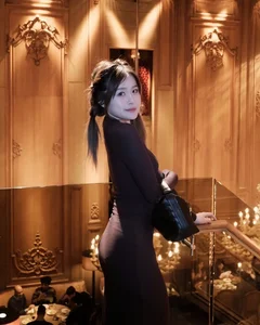 Rich Kid Chao Transitions from Cute to Seductive in Deep-Cut Dress - image 0
