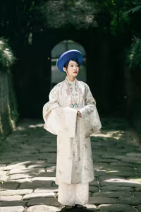 VGU No.157: The Grace of Traditional Vietnamese Ao Dai Blending with Ancient Cultural Heritage - image 4