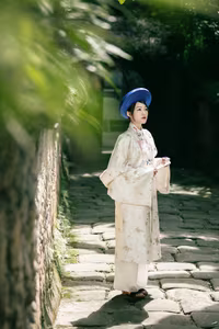 VGU No.157: The Grace of Traditional Vietnamese Ao Dai Blending with Ancient Cultural Heritage - image 3