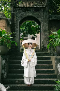 VGU No.157: The Grace of Traditional Vietnamese Ao Dai Blending with Ancient Cultural Heritage - image 0