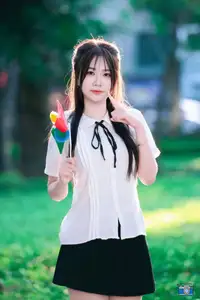 Radiant Youth: Vietnamese Girl's Bright Smile with Pinwheel in Golden Sunlight - image 4