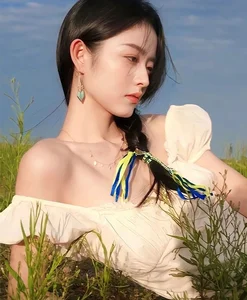 Stunning Outdoor Photography: Capturing Natural Beauty and Bold Fashion in Serene Stream Settings - image 3