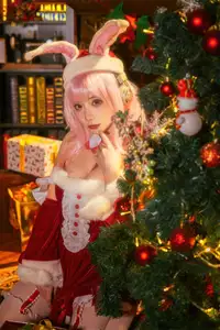 Coser Sonico Christmas: Sweet & Alluring Santa Bunny Beside Sparkling Tree - image 2