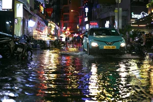 Exploring Ho Chi Minh City in the Rain: Locals and Tourists Embrace the Weekend Despite Stormy Weather - image 12