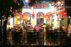 Exploring Ho Chi Minh City in the Rain: Locals and Tourists Embrace the Weekend Despite Stormy Weather - image 0