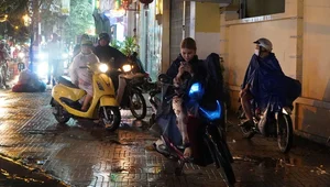 Exploring Ho Chi Minh City in the Rain: Locals and Tourists Embrace the Weekend Despite Stormy Weather - image 9