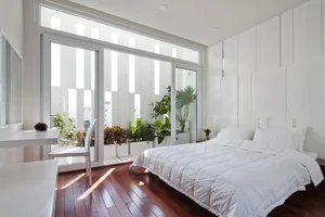 Innovative Saigon Townhouse Architecture: Exploring the Unique Hollow Slot Facade Design - image 2